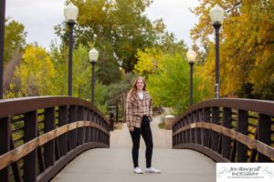 Littleton high school senior photographer Golden Clear Creek bridge Lakewood taekwondo black belt class of 2022 fall leaves photography