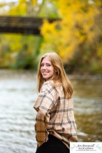 Littleton high school senior photographer Golden Clear Creek bridge Lakewood taekwondo black belt class of 2022 fall leaves photography