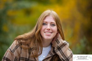 Littleton high school senior photographer Golden Clear Creek bridge Lakewood taekwondo black belt class of 2022 fall leaves photography