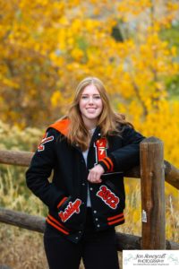 Littleton high school senior photographer Golden Clear Creek bridge Lakewood taekwondo black belt class of 2022 fall leaves photography
