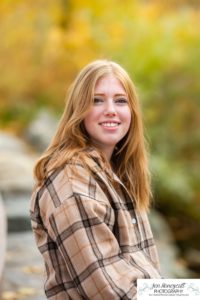 Littleton high school senior photographer Golden Clear Creek bridge Lakewood taekwondo black belt class of 2022 fall leaves photography