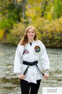 Littleton high school senior photographer Golden Clear Creek bridge Lakewood taekwondo black belt class of 2022 fall leaves photography taekwondo