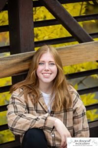 Littleton high school senior photographer Golden Clear Creek bridge Lakewood taekwondo black belt class of 2022 fall leaves photography