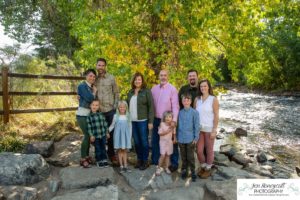Littleton family photographer extended grandparents cousins Golden Clear Creek area yellow leaves trees water old buildings morning light photography