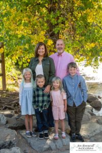 Littleton family photographer extended grandparents cousins Golden Clear Creek area yellow leaves trees water old buildings morning light photography