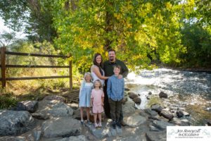 Littleton family photographer extended grandparents cousins Golden Clear Creek area yellow leaves trees water old buildings morning light photography