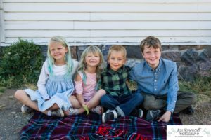 Littleton family photographer extended grandparents cousins Golden Clear Creek area yellow leaves trees water old buildings morning light photography