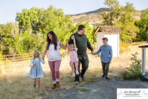 Littleton family photographer extended grandparents cousins Golden Clear Creek area yellow leaves trees water old buildings morning light photography