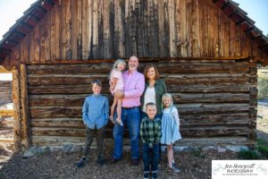 Littleton family photographer extended grandparents cousins Golden Clear Creek area yellow leaves trees water old buildings morning light photography