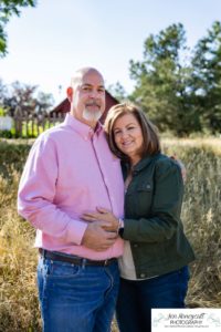 Littleton family photographer extended grandparents cousins Golden Clear Creek area yellow leaves trees water old buildings morning light photography