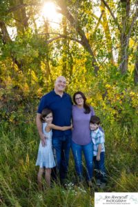 Littleton family photographer Standley Lake Colorado yellow trees leaves fall brother sister beach sand love sunset photography Halloween