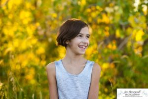 Littleton family photographer Standley Lake Colorado yellow trees leaves fall brother sister beach sand love sunset photography Halloween