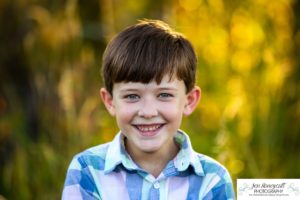 Littleton family photographer Standley Lake Colorado yellow trees leaves fall brother sister beach sand love sunset photography Halloween