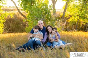 Littleton family photographer Standley Lake Colorado yellow trees leaves fall brother sister beach sand love sunset photography Halloween