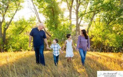 The {K} family of 4 at Standley Lake in the fall by Littleton photographer
