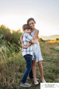 Littleton family photographer Standley Lake Colorado yellow trees leaves fall brother sister beach sand love sunset photography Halloween