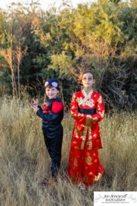 Littleton family photographer Standley Lake Colorado yellow trees leaves fall brother sister beach sand love sunset photography Halloween