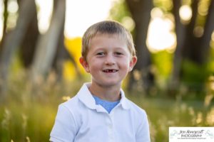 Littleton family photographer in Colorado 17 Mile House Parker fall leaves big trees brothers sister cute kids two year old sunset photography