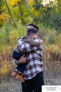 Littleton family photographer Lair O the Bear park Morrison Colorado fall color little boy three years old sunset yellow trees mother father photography photo session