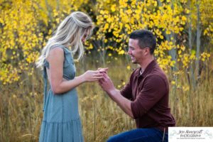 Littleton couple photographer Meyer Ranch Colorado aspen trees yellow leaves proposal engaged engagement photo session proposed future husband and wife dog diamond ring wedding photography