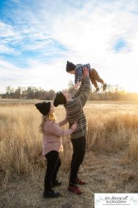 Littleton family photographer grandmother grandkids babies baby boy girl sisters cousins 17 Mile House Parker Colorado sunset fall photography barns