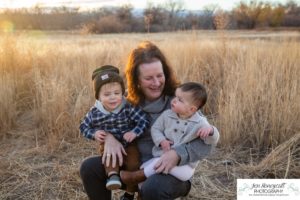 Littleton family photographer grandmother grandkids babies baby boy girl sisters cousins 17 Mile House Parker Colorado sunset fall photography barns