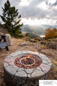 Littleton family photographer mountain camping views Evergreen firepit smores kids roasting marshmallows branding photo session outdoors tent ramble photography