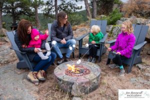 Littleton family photographer mountain camping views Evergreen firepit smores kids roasting marshmallows branding photo session outdoors tent ramble photography