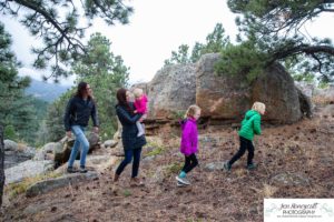 Littleton family photographer mountain camping views Evergreen firepit smores kids roasting marshmallows branding photo session outdoors tent ramble photography