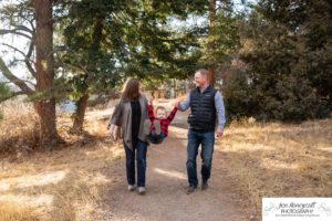 Littleton family photographer Colorado Mt. Falcon park cold wind little boy mountain view fun moments parenthood sunset photography sweet child