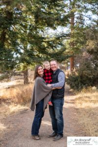 Littleton family photographer Colorado Mt. Falcon park cold wind little boy mountain view fun moments parenthood sunset photography sweet child