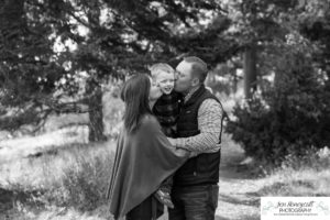 Littleton family photographer Colorado Mt. Falcon park cold wind little boy mountain view fun moments parenthood sunset photography sweet child