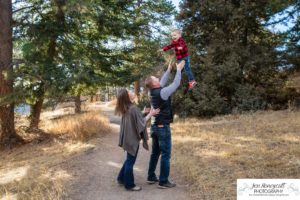 Littleton family photographer Colorado Mt. Falcon park cold wind little boy mountain view fun moments parenthood sunset photography sweet child