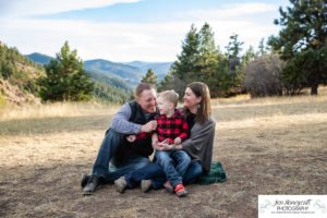 Littleton family photographer Colorado Mt. Falcon park cold wind little boy mountain view fun moments parenthood sunset photography sweet child