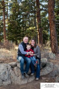 Littleton family photographer Colorado Mt. Falcon park cold wind little boy mountain view fun moments parenthood sunset photography sweet child