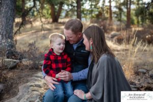 Littleton family photographer Colorado Mt. Falcon park cold wind little boy mountain view fun moments parenthood sunset photography sweet child