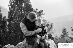 Littleton family photographer Colorado Mt. Falcon park cold wind little boy mountain view fun moments parenthood sunset photography sweet child