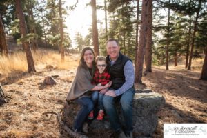 Littleton family photographer Colorado Mt. Falcon park cold wind little boy mountain view fun moments parenthood sunset photography sweet child