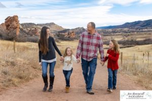 Littleton family photographer Colorado connection photography sunset South Valley red rocks extended grandparents uncle kids siblings winter light connected moments