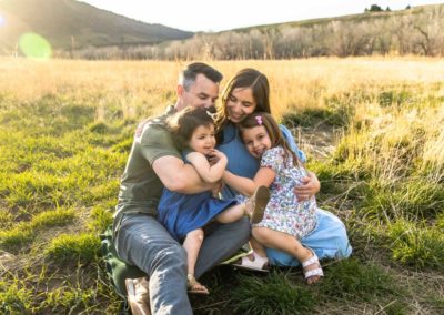 Littleton family photographer extended grandparents grandchildren Hildebrand Ranch little girls cousins kids daughter sisters foothills sunset photography