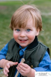 Littleton family photographer Denver City park toddler boy boathouse mother father son spring Colorado photography trees bloom