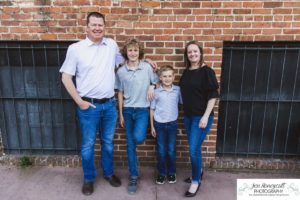 Littleton family photographer Morrison urban photo session boys brothers mother father sons bridge license plate wall photography sunset spring Colorado river