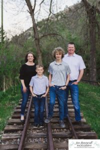 Littleton family photographer Morrison urban photo session boys brothers mother father sons bridge license plate wall photography sunset spring Colorado river