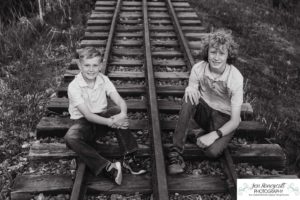 Littleton family photographer Morrison urban photo session boys brothers mother father sons bridge license plate wall photography sunset spring Colorado river