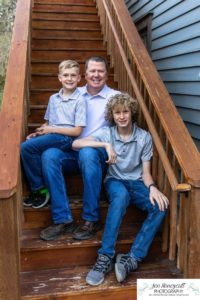 Littleton family photographer Morrison urban photo session boys brothers mother father sons bridge license plate wall photography sunset spring Colorado river