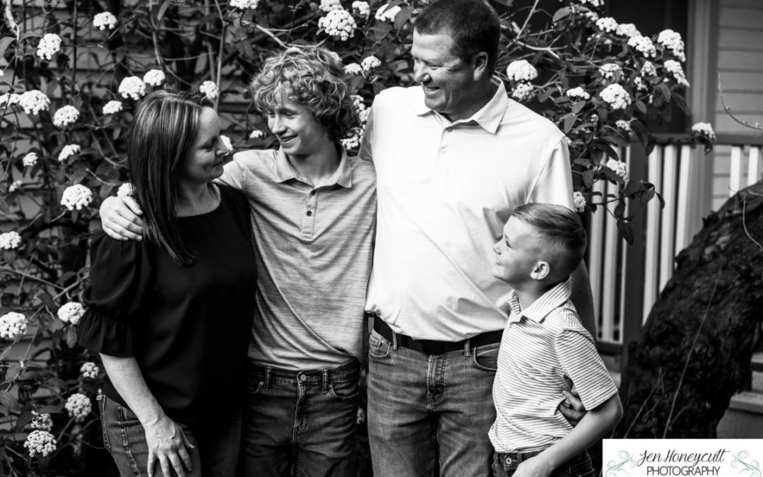 The {R} family of 4 in downtown Morrison by Littleton photographer