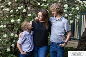 Littleton family photographer Morrison urban photo session boys brothers mother father sons bridge license plate wall photography sunset spring Colorado river