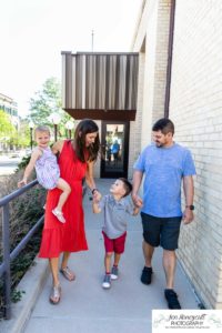 Littleton family photographer Downtown Golden urban photo session big brother little sister mother father son daughter fourth of July photography summer hot siblings snuggles real moments Colorado