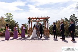 Littleton wedding photographer Willow Ridge Manor Morrison red rocks bride groom in love married marriage mr. mrs. bridesmaids groomsmen outdoor spring weather photography foothills Colorado white dress