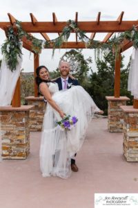 Littleton wedding photographer Willow Ridge Manor Morrison red rocks bride groom in love married marriage mr. mrs. bridesmaids groomsmen outdoor spring weather photography foothills Colorado white dress